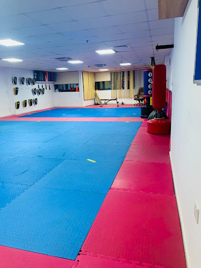 أكاديمية أوكيناوا للفنون القتالية عجمان الإمارات - United Arab Emirates|near ADCB Signal - Al Rashidiya 2 - Ajman|Tower B1 3rd Floor 306|Falcon Towers