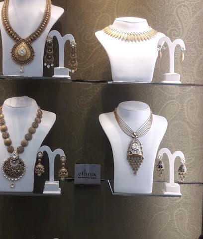 ملبار للذهب والماس - الرولة (فرع 1) - دبي - +971 6 563 9162