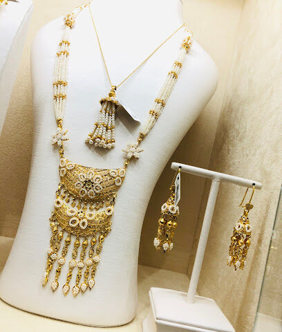 مجوهرات الجوهرة - جمعية حلوان التعاونية - دبي - +971 6 522 0263