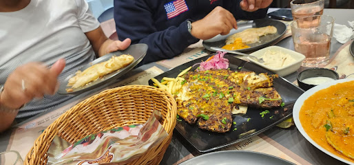 مطعم كاليكوت جريل - دبي - +971 6 566 5676
