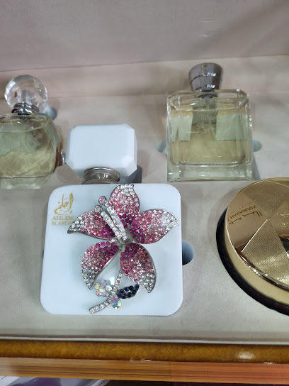 عطور الحرمين - United Arab Emirates|Mraisheed - Fujairah|4 Hamad Bin Abdulla Rd|Black tower building Shop