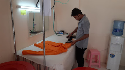 نجمة المجاز لكي الملابس - دبي - +971 6 524 6979