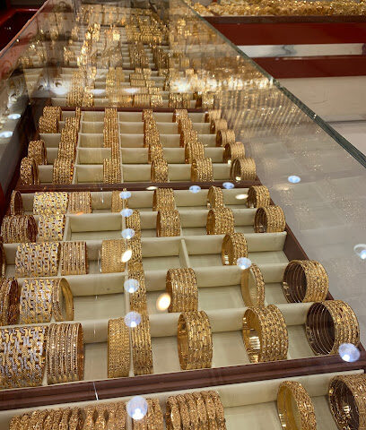 مجوهرات الرميزان - دبي - +971 6 573 4062