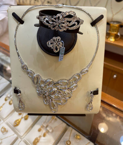 مجوهرات الرميزان - دبي - +971 3 764 0402