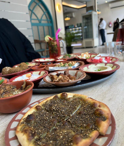 مطعم KAAKI W NOS - دبي - +971 3 754 4450